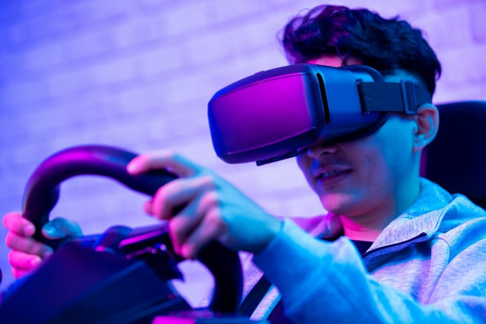 Man sim racing with virtual reality headset